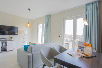 Ferienwohnung für 5 Personen, mit Sauna und Balkon sowie Seeblick, mit Haustier in Wustrow