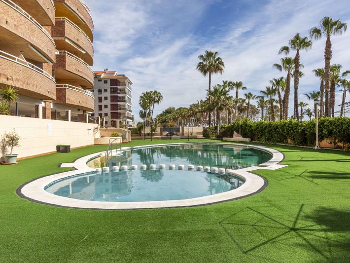 Apartamento para 6 personas, con jardín además de piscina para niños y terraza en Marina d'Or