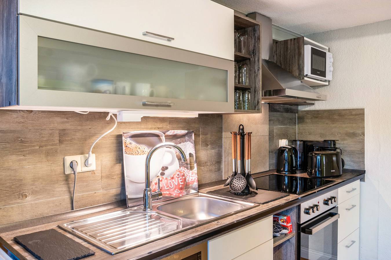 Ferienhaus 'Deichperle Tini' mit gemeinsamer Terrasse und Wlan in Dornumersiel, Dornum