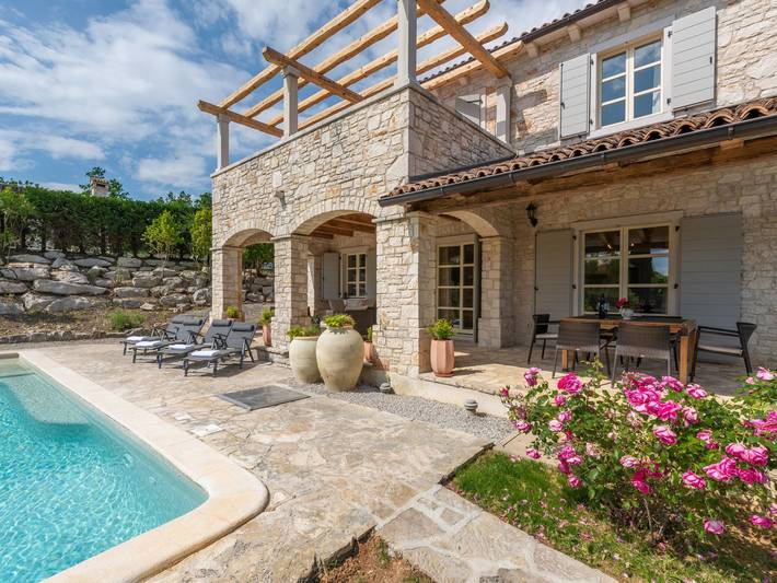 Ferienhaus für 8 Personen, mit Ausblick und Balkon sowie Garten