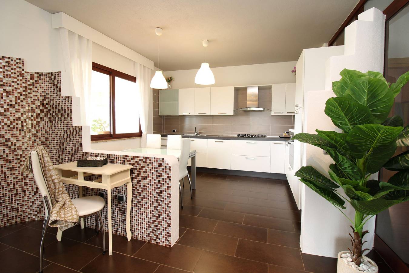 Casa vacanze con giardino e zona barbecue,3 camere letto,1 km dal mare  in La Caletta, Siniscola