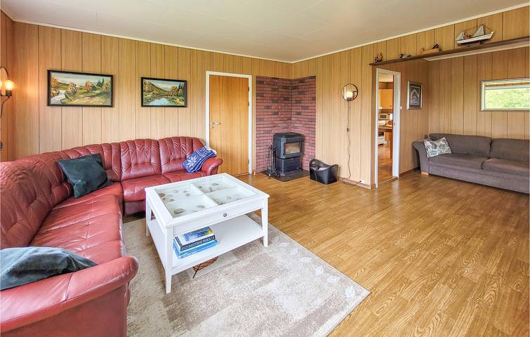 Ferienhaus für 8 Personen mit Garten in Tysnes