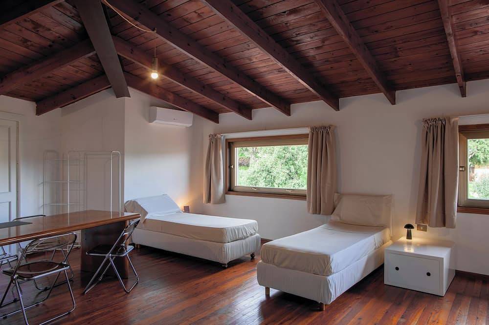 Villa surrounded by green hills overlooking the sea in Poggio dei Pini, Capoterra