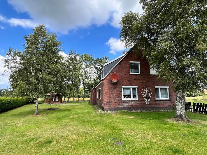 Ferienwohnung für 2 Personen, mit Terrasse und Garten, kinderfreundlich in Holtgast