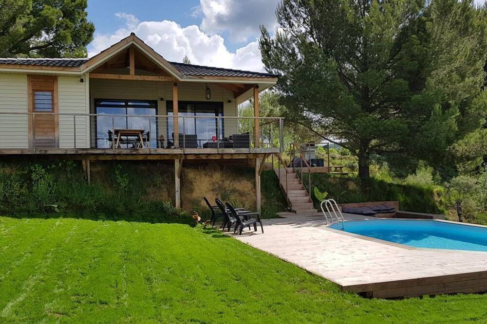 Villa bois Lodge terrasse pilotis, piscine chauffée, vue exceptionnelle vignes, classé 3* in Plaissan, Région de Lodève