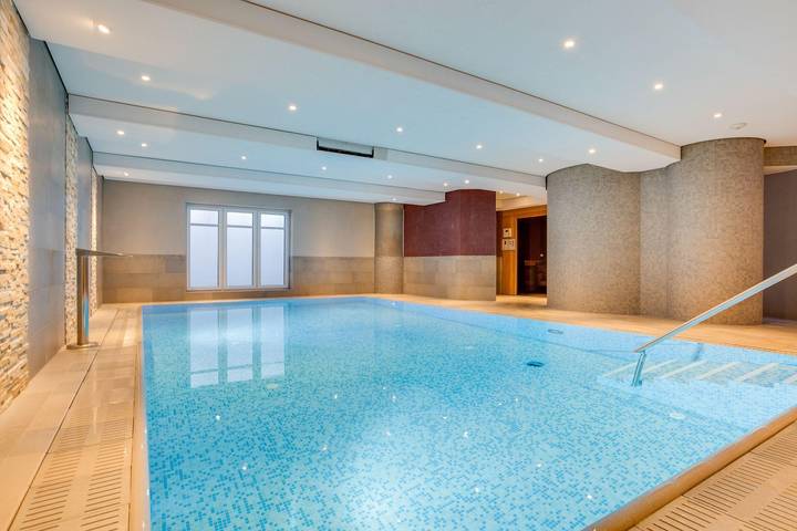 Ferienwohnung für 4 Personen, mit Terrasse und Garten sowie Pool und Sauna in Westerland