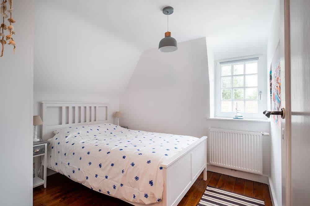 Cottage typique de la Côte Belge à quelques pas de la mer avec parking privé. in Coxyde-les-Bains, Coxyde