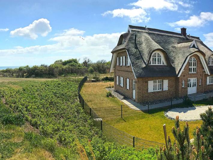 Luxus-Ferienhaus für 6 Personen, mit Terrasse und Garten sowie Sauna und Ausblick in Mönchgut