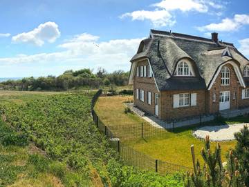 Strandhaus für 6 Personen, mit Terrasse und Sauna sowie Garten und Ausblick, kinderfreundlich in Lobbe