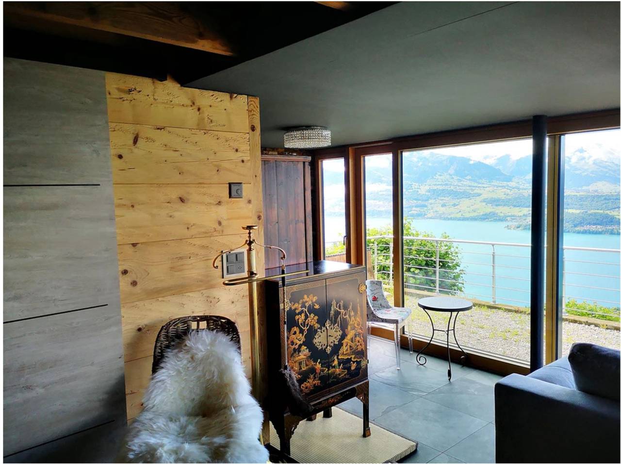 Chalet avec vue panoramique sur les montagnes de l'Oberland et le lac de Thoune in Sigriswil, Lac de Thoune