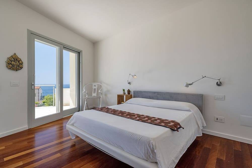 Luxury Seafront Villa with Rooftop Pool & Stunning Sea Views in Fertilia, Alghero