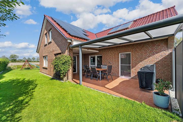 Ferienhaus für 8 Personen, mit Ausblick und Garten, mit Haustier in Krummhörn