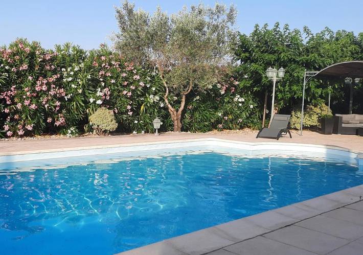 Appartement de vacances pour 2 personnes, avec Terrasse et Jardin ainsi que Piscine et Vue