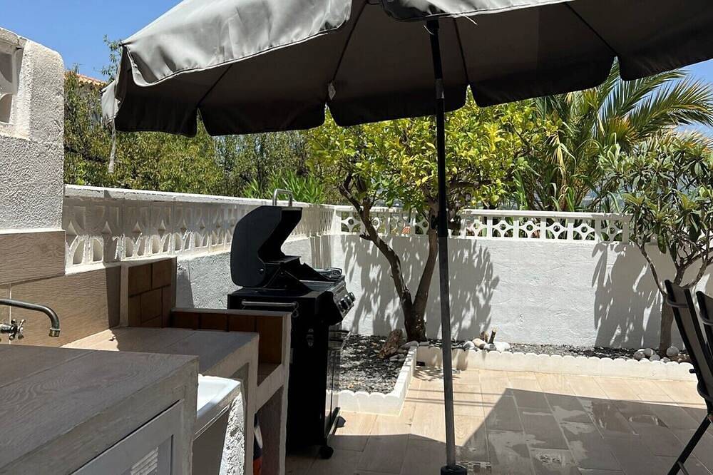 Geheel appartement, Albir Appartement in huis met gemeenschappelijk zwembad, met de tuin in L'Albir, L'Alfàs del Pi