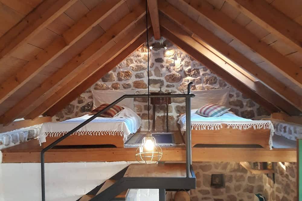 Completely renovated small stone house with sea view near Split in Split-Dalmatia
