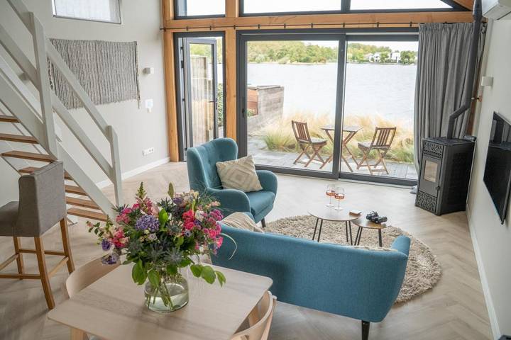 Cottage pour 2 personnes, avec vue sur le lac et jardin ainsi que vue et terrasse à Goes