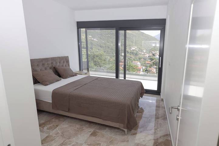 The house is our passion project, built with love surrounded by forest and views in Kamenari, Bay of Kotor
