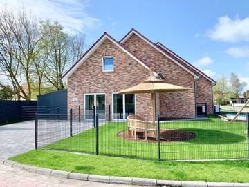 Ferienhaus für 10 Personen, mit Sauna und Ausblick sowie Garten und Seeblick, mit Haustier in Wangerland