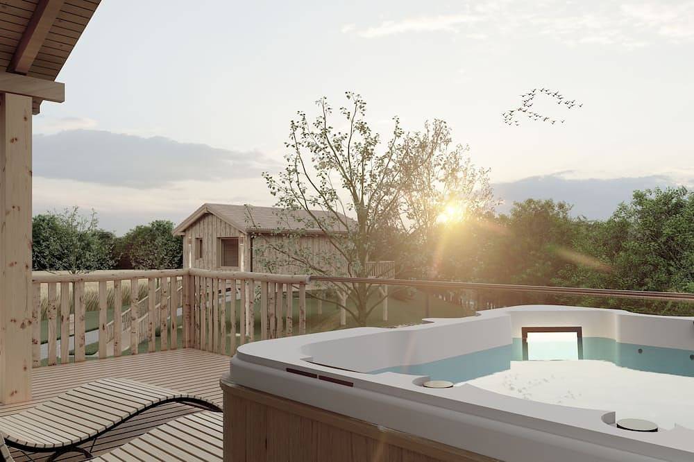 Ganze Wohnung, Neptun Chalet, 30 qm, mit Whirlpool und 30 qm Terrasse, max. 3 Personen in Bühlertann, Hohenlohe