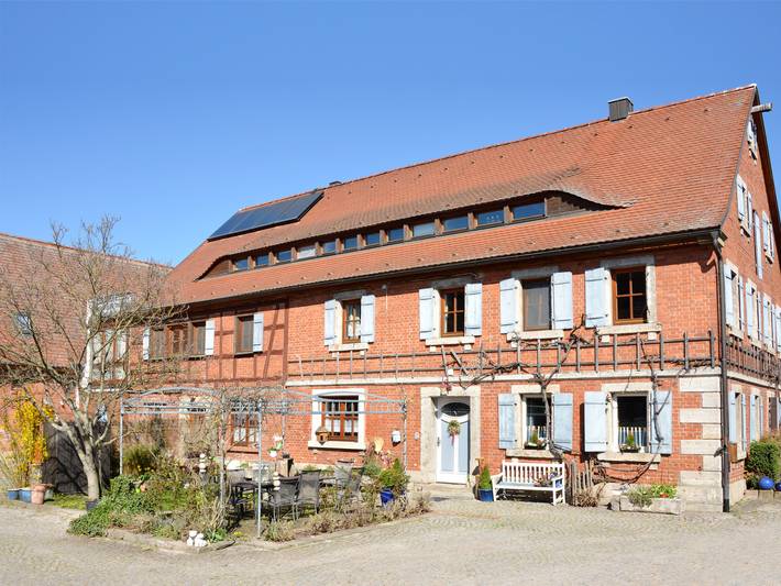 Ferienwohnung für 4 Personen, mit Balkon/Terrasse und Terrasse sowie Garten im Steigerwald