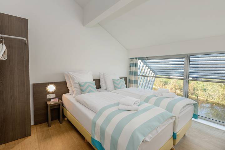 Cottage für 6 Personen, mit Seeblick und Sauna sowie Kinderpool und Garten in De Haan - 2