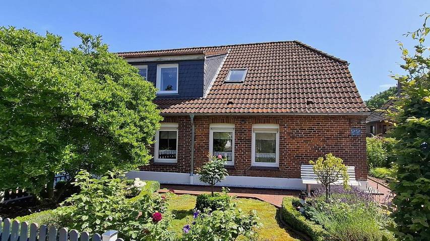 Ferienwohnung für 4 Personen, mit Terrasse und Garten in Neugarmssiel