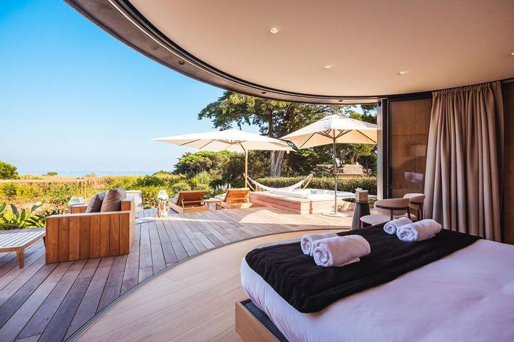 Station pour 6 personnes, avec sauna et vue ainsi que piscine et jardin, animaux acceptés dans Plage de Pampelonne