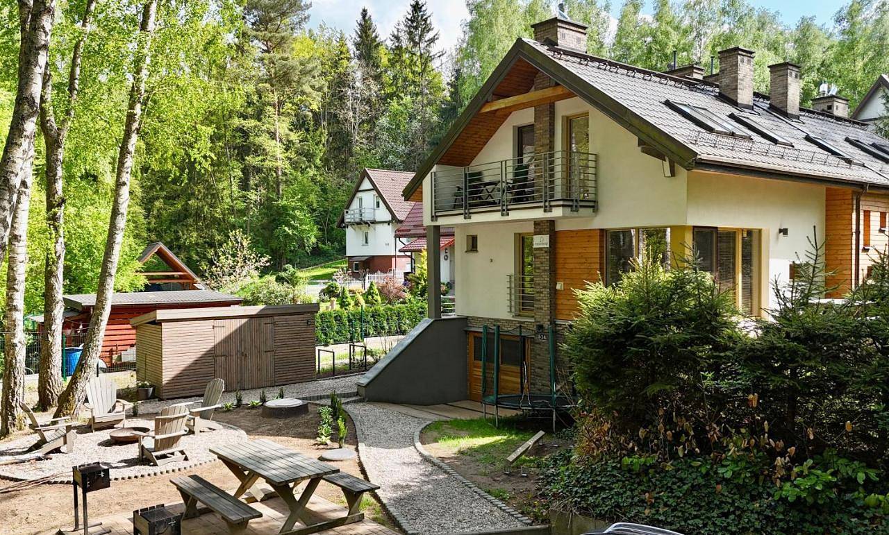 Cały apartament, Mazursko - komfortowe apartamenty nad jeziorem, sauna, kominki na parterze in Pojezierze Iławskie