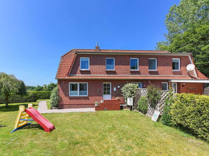 Ferienwohnung für 7 Personen, mit Terrasse und Garten sowie Seeblick in Holtgast - 2