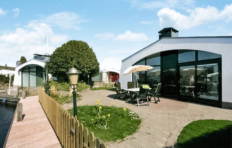 Ferienhaus für 4 Personen, mit Terrasse und Garten sowie Ausblick