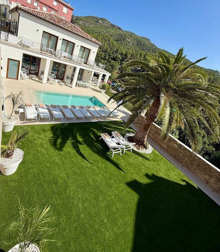 Casa de vacaciones para 12 personas, con Balcón y Terraza además de Jardín y Piscina en Montanejos