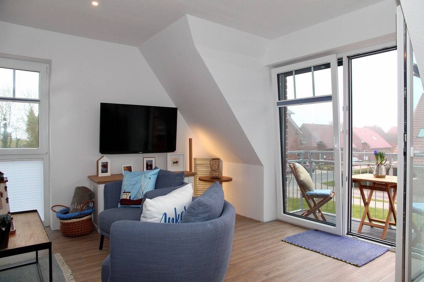 Ganze Wohnung, Neue Ferienwohnung Deichkrone mit Hafenblick, Balkon & Infrarotkabine in Greetsiel, Krummhörn