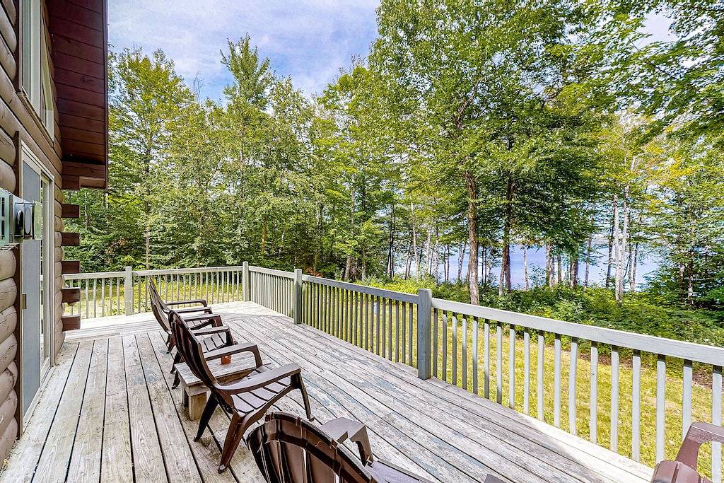 Lakefront cabin on First Roach Pond with dock, lake view & firepit- dog-friendly in Piscataquis County