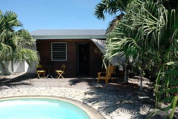 Maison de vacances pour 2 personnes, avec piscine ainsi que vue et jardin dans Guyane française