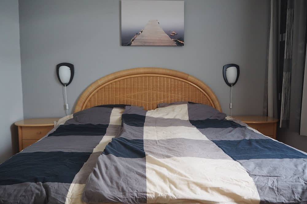 Comfortabele en zonnige bungalow bij strand, duinen en bloemvollenvelden in Sint Maartensvlotbrug, Nederlandse Noordzeekust