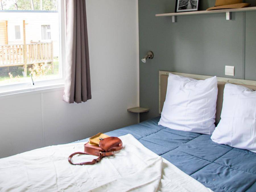 Camping Le Saint Laurent - Mobilhome 4 personas - Mobil-home confort - 29m² - 2 habitaciones - terraza semi-cubierta in Golf Saint-Laurent, Ploemel