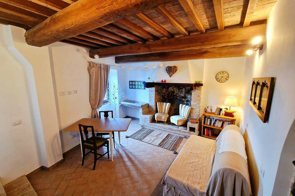 Geheel appartement, Tower of Time. Period residence in a tower from the 1400s. Nature, quiet and art in Torgiano, Provincie Perugia