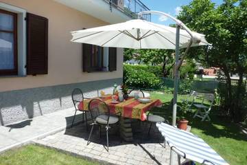 Gîte pour 5 personnes, avec jardin à Lenno