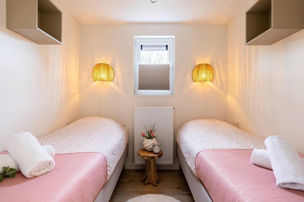 Luxuriöse Waldunterkunft mit Terrasse und Grill in Veluwe