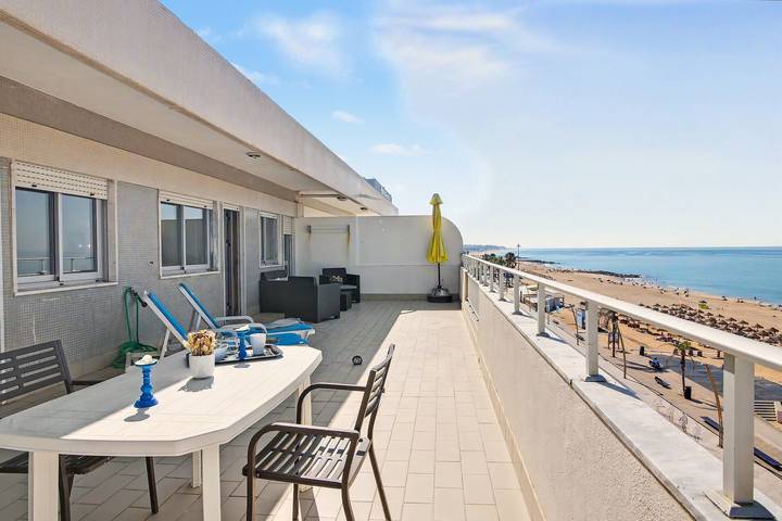 Ferienhaus 'T1 mit Terrasse direkt am Strand' mit Meerblick, Balkon und Wlan in Cavacos, Quarteira