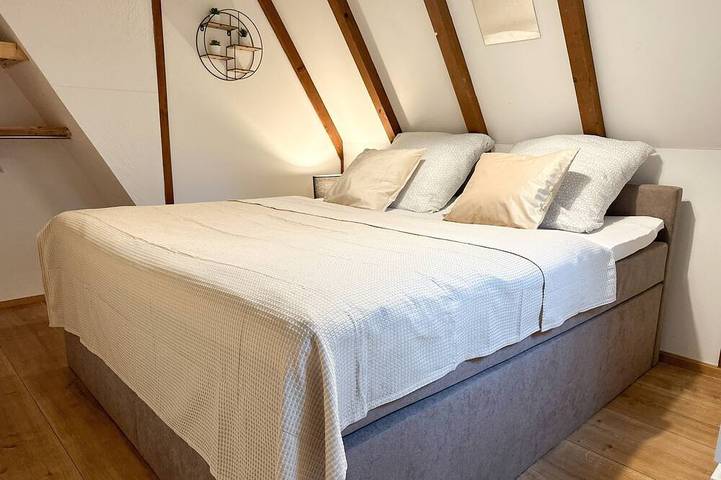 Ferienhaus für 4 Personen, mit Balkon und Garten