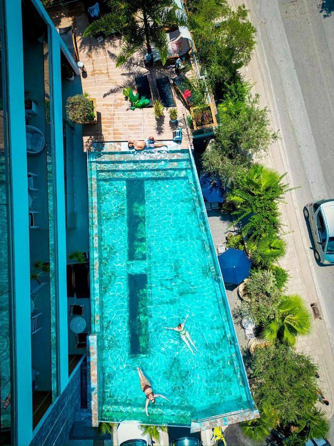 Hôtel pour 4 personnes, avec Balcon et Terrasse ainsi que Jardin et Piscine