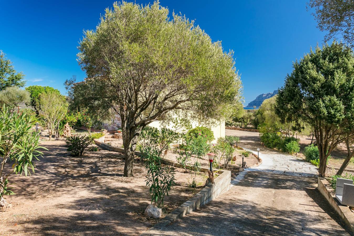 Ganze Wohnung, Ferienwohnung "Casa Relax" mit Blick auf die Berge und das Meer, Garten, Wlan & Terrasse in Loiri Porto San Paolo, Olbia-Tempio