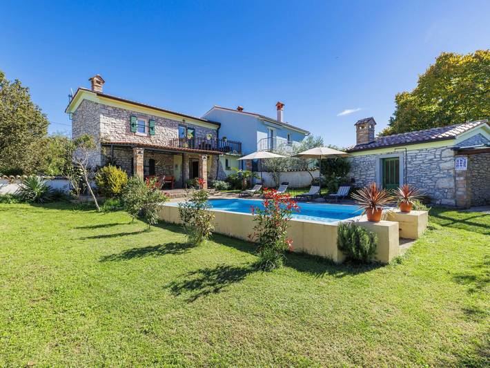 Ferienhaus für 4 Personen, mit Balkon und Garten