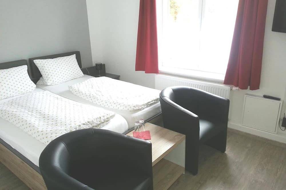 Doppelzimmer klein (Standard) - Pension Marktblick - bed & breakfast in Friedrichstadt, Eider-Treene-Sorge