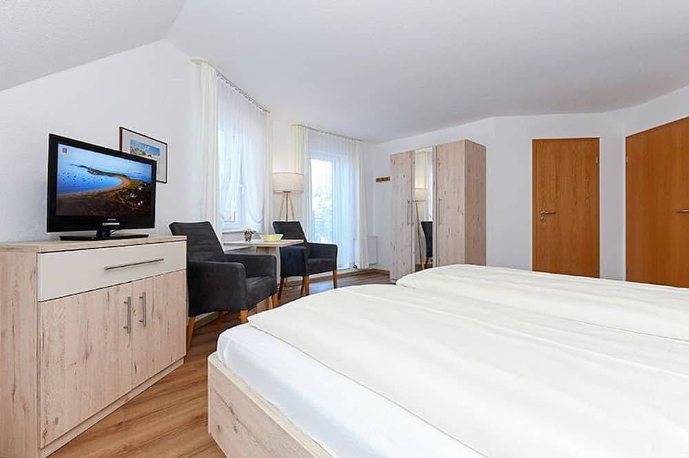 Doppelzimmer mit Balkon oder Terrasse - Doppelzimmer in der Hotel-Pension in Neuharlingersiel, Nordseeküste