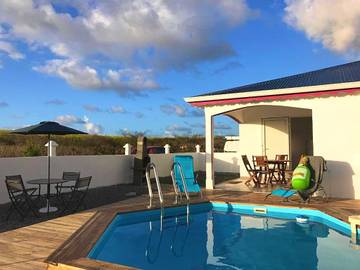 Cottage pour 5 personnes, avec terrasse et piscine à Le Moule
