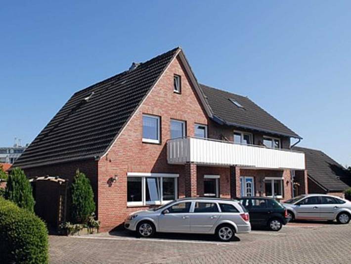 Ferienwohnung für 4 Personen, mit Terrasse und Garten sowie Sauna in Bensersiel