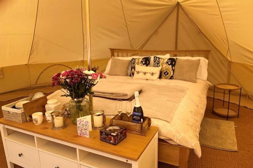 Bell tent in ultimate luxury with a wood fired hot tub, super king size bed in Stafford, Staffordshire