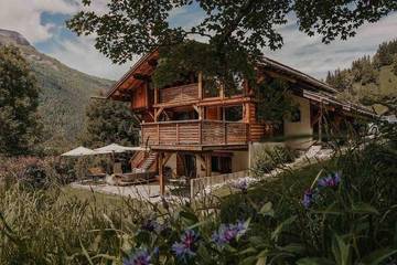 Chalet pour 14 personnes, avec vue ainsi que sauna et jardin à Les Contamines-Montjoie